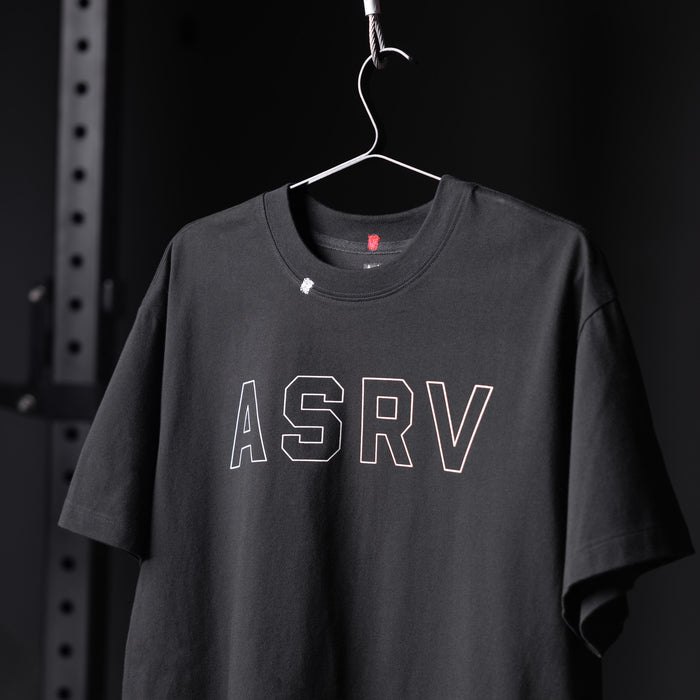 ASRV Tech Essential Relaxed Tee in black with white outline logo, displayed on hanger