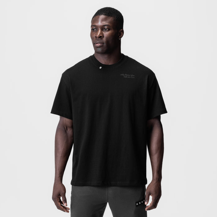 Black Tech Essential Relaxed Tee worn by model, front view