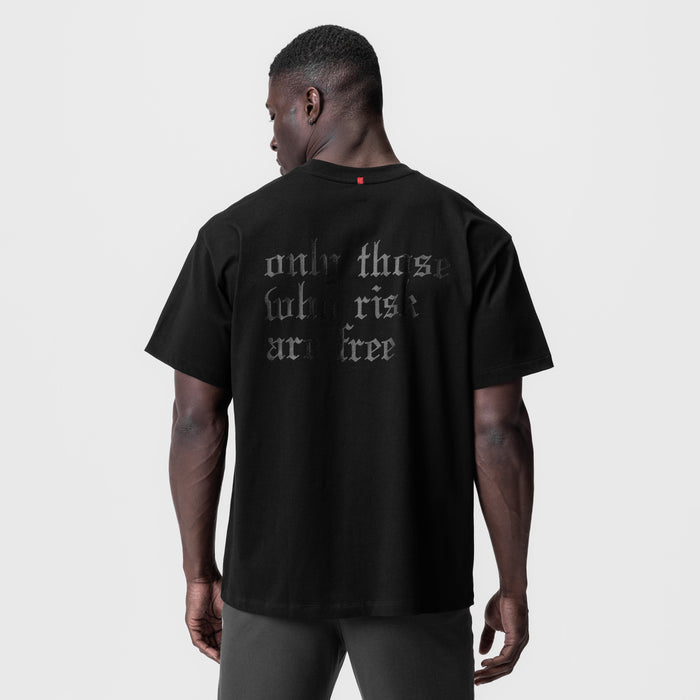 Black Tech Essential Relaxed Tee with 'OTWR' graphic, back view on model