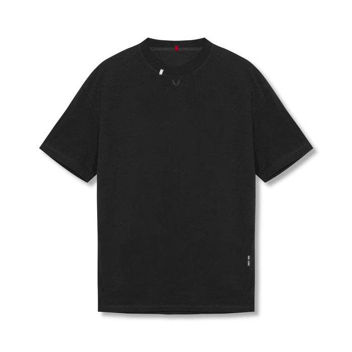 Flatlay of Tech Essential Relaxed Tee in black, front view on white background