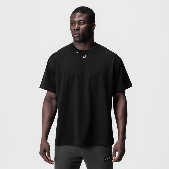 Black Tech Essential Relaxed Tee worn by model, front view