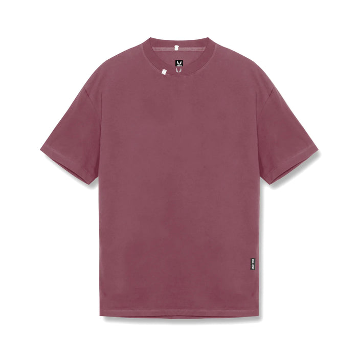 flatlay Tech Essential Relaxed Tee in faded crimson, front view