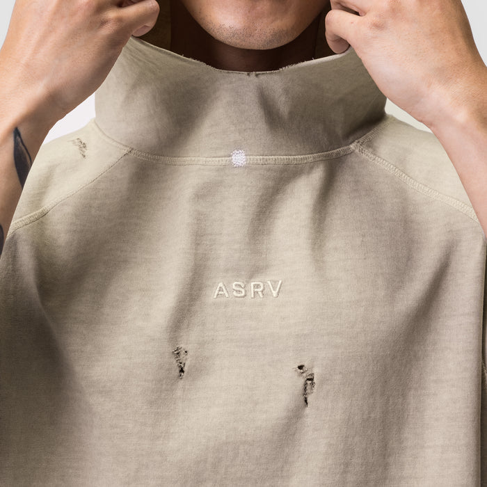 Tech Essential Cutoff Hoodie in faded beige worn by model, front view