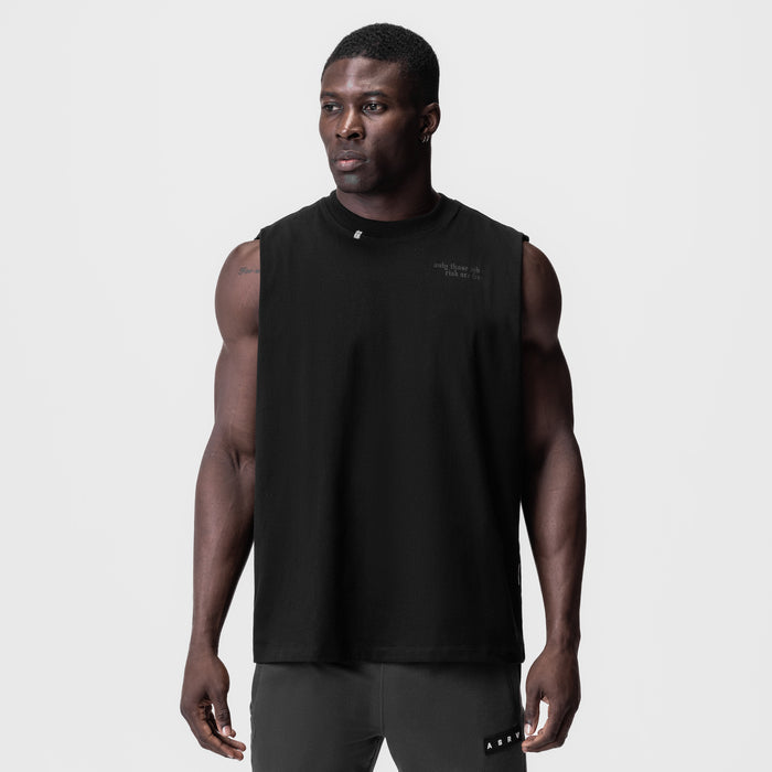 Black Tech Essential Relaxed Cutoff sleeveless shirt worn by male model, front view