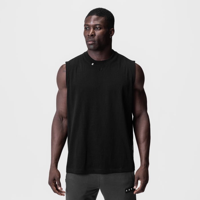 Black Tech Essential Relaxed Cutoff sleeveless tank on model, front view