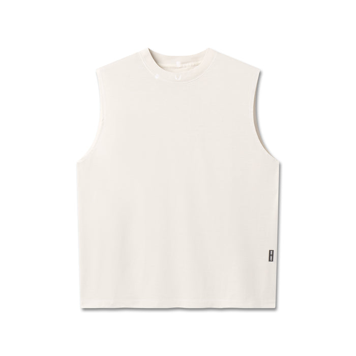 flatlay Tech Essential Relaxed Cutoff sleeveless tank in faded stone, front view