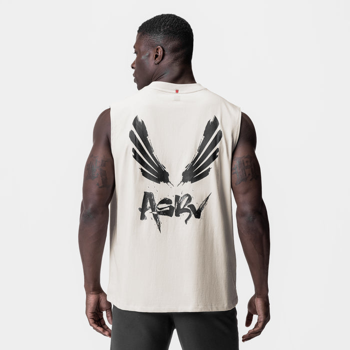 Tech Essential Relaxed Cutoff tank in stone with brush wings graphic, back view on model