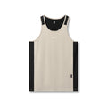 flatlay Supima® Mesh Panel Training Singlet in sand with black mesh panels, front view
