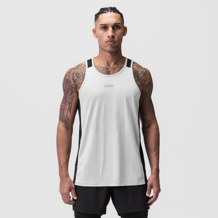 White Supima® Mesh Panel Training Singlet with black side panels, worn by model, front view