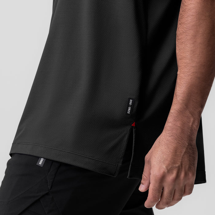 AeroSilver® Oversized Tee in black worn by model, side detail view