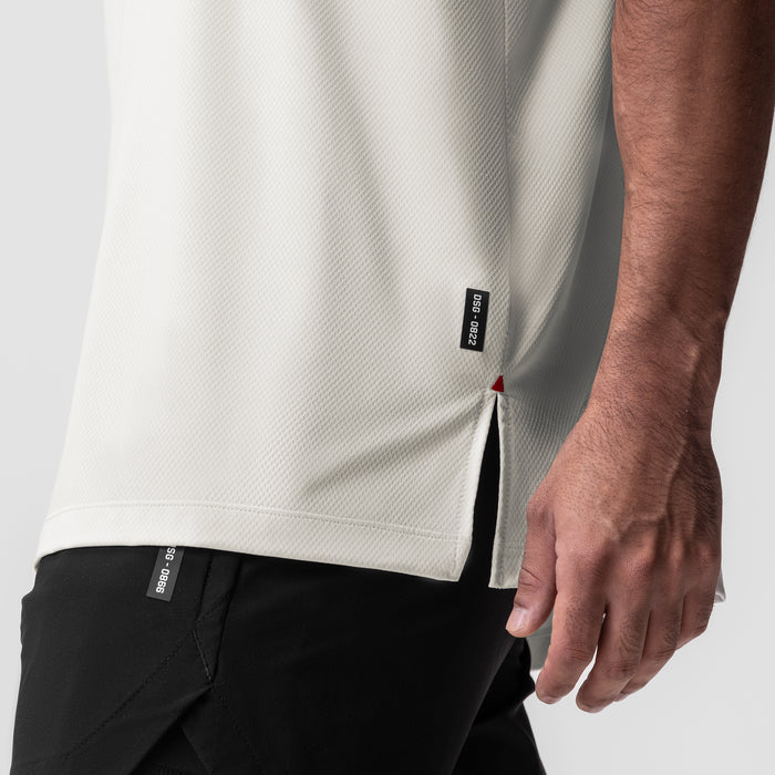 AeroSilver Oversized Tee in Ivory Cream worn by model, side detail view
