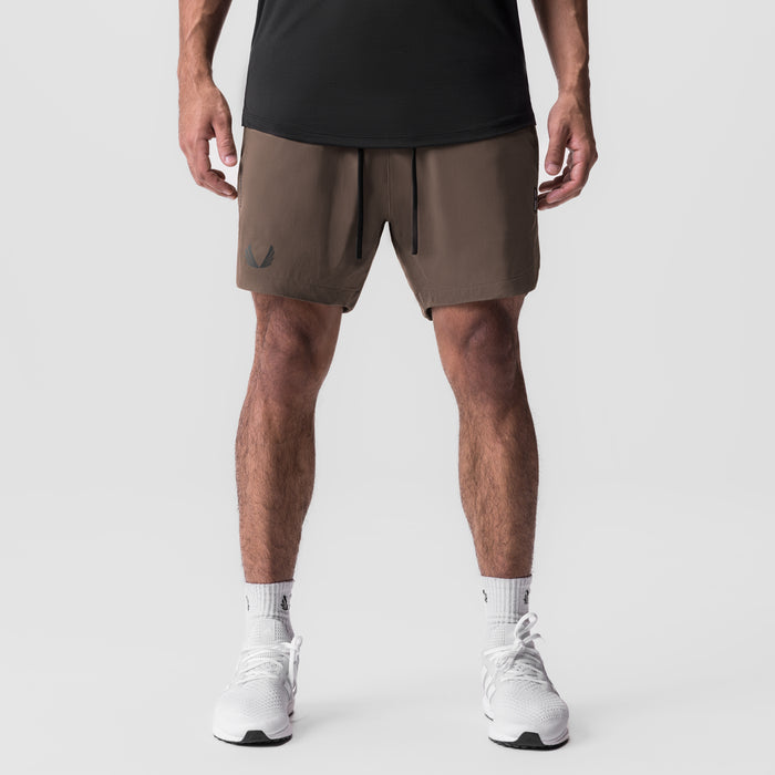 Tetra-Lite Linerless Short in deep taupe, front view on model