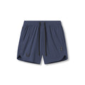 flatlay Tetra-Lite 7" Linerless Short in navy with Wings design, front view