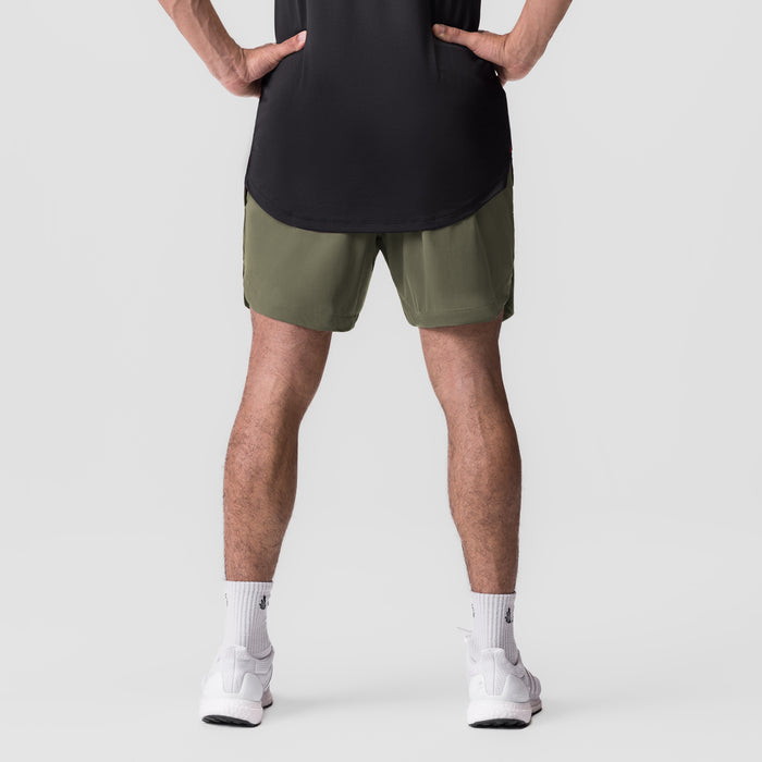 Tetra-Lite 7" Linerless Short in olive, front view on model