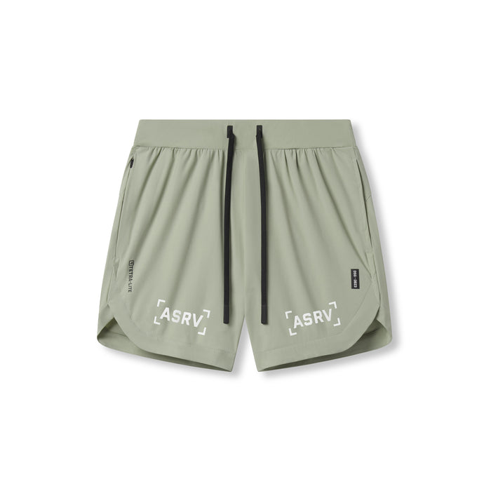 Flatlay of ASRV Tetra-Lite 7" Linerless Shorts in sage with bracket logo, front view