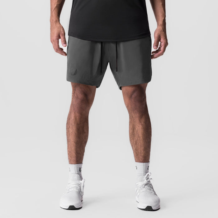 Tetra-Lite 7" Linerless Short in Space Grey worn by model, front view