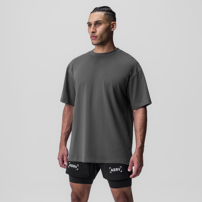 Supima® Oversized Tee in raven gray worn with black shorts, front view on model
