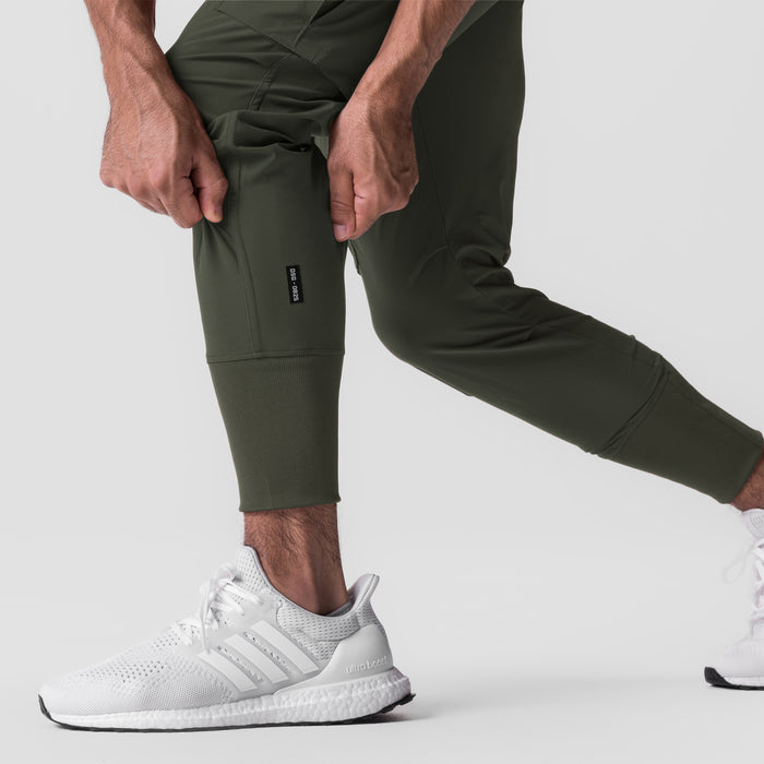 Tetra-Lite Cargo High Rib Jogger in olive worn by model, front view