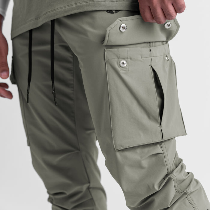 Tetra-Lite Cargo High Rib Jogger in sage worn by model, side detail view