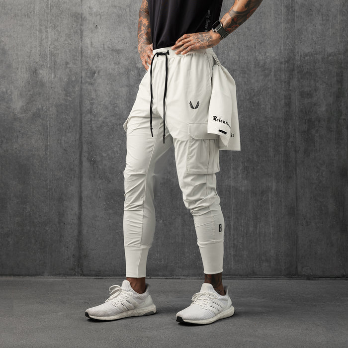 Tetra-Lite Cargo High Rib Jogger in stone worn by model, front view