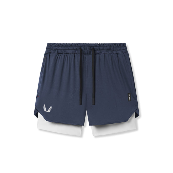 Flatlay of Silver-Lite™ 5" Liner Short in navy with white wings logo and white underlay, top view