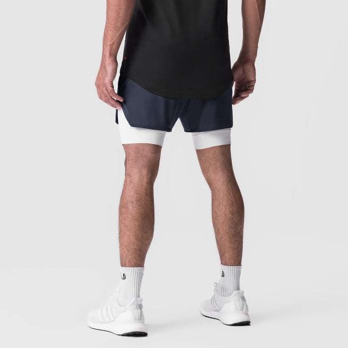 Silver-Lite 5" Liner Short in Navy and White, worn by model from behind