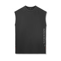 Flatlay of Silver-Lite™ 2.0 Oversized Cutoff sleeveless tank in black with vertical text graphic, front view