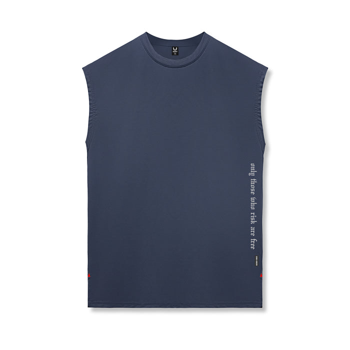 Flatlay of Silver-Lite™ 2.0 Oversized Cutoff sleeveless tank in navy with OTWR text detail