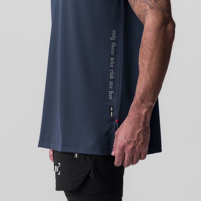 Silver-Lite™ 2.0 Oversized Cutoff in navy, worn by model showing side view and text detail