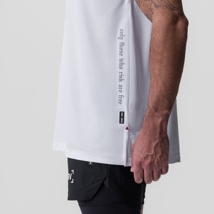 Silver-Lite™ 2.0 Oversized Cutoff tee in white, worn by model showing side view and sleeve detail