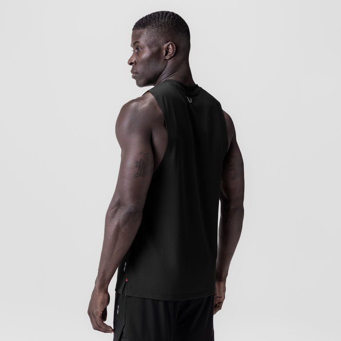 Black 3D-Lite® 2.0 Lycra® muscle tank worn by model, side profile view
