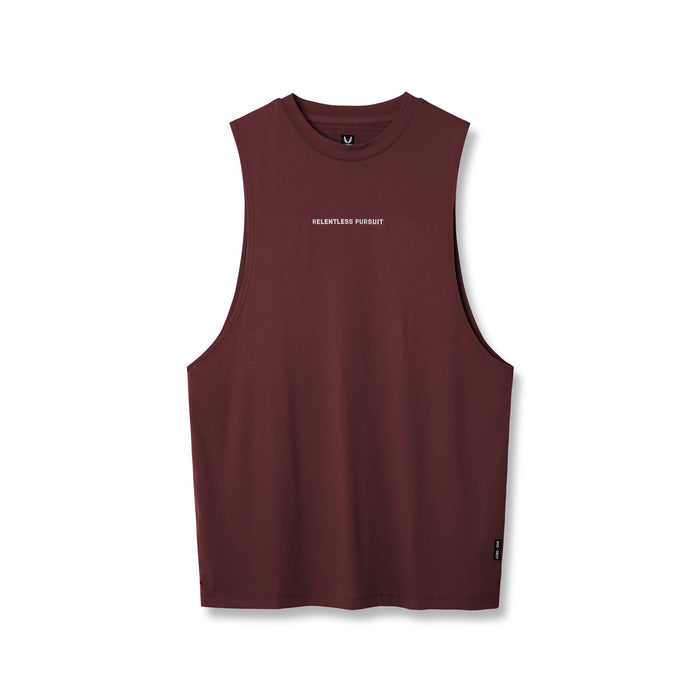 flatlay 3D-Lite® 2.0 Lycra® Muscle Tank in crimson with 'Relentless Pursuit' text, front view