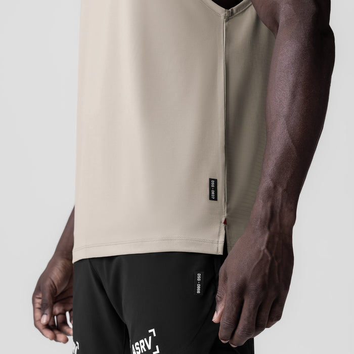 3D-Lite® 2.0 Lycra® Muscle Tank in sand smoke worn by model, side view