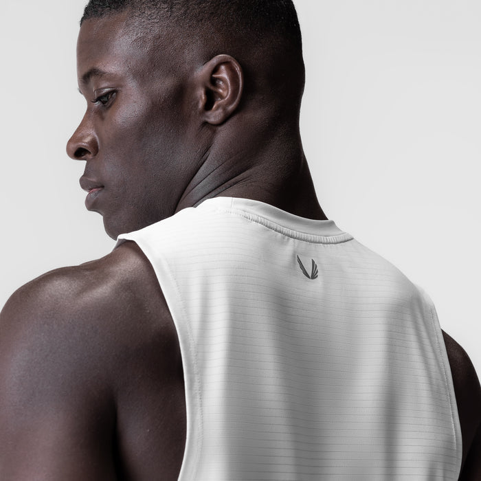 White 3D-Lite® 2.0 Lycra® muscle tank on model, side profile view