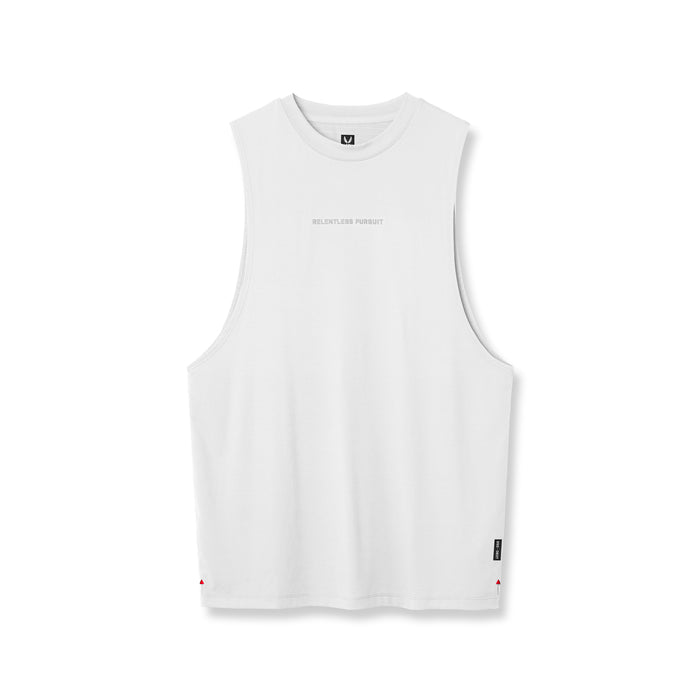 Flatlay of white 3D-Lite Lycra muscle tank with 'Relentless Pursuit' text, front view