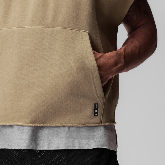 Tech Essential Raw Hem Cutoff Hoodie in khaki, worn by model with hand in pocket