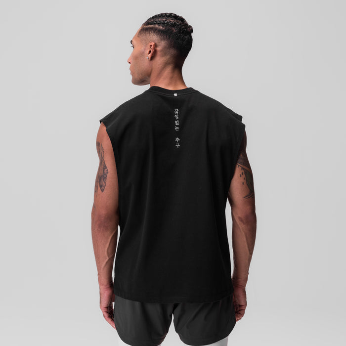 Tech Essential Rocker Cutoff in black, rear view on model