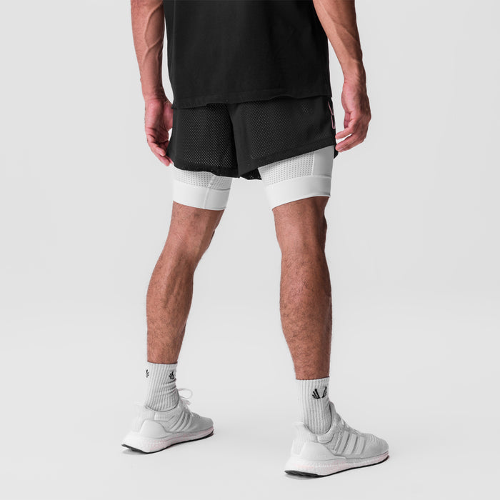 SilverPlus™ Mesh 5" Liner Short in Black/White, back view on model