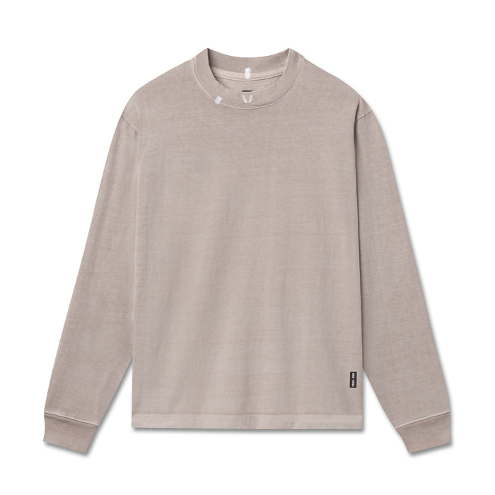 flatlay Tech Essential Relaxed Long Sleeve in faded chai, front view