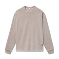 flatlay Tech Essential Relaxed Long Sleeve in faded chai, front view
