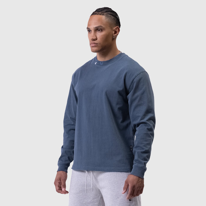 Tech Essential Relaxed Long Sleeve in faded navy worn by model, front view