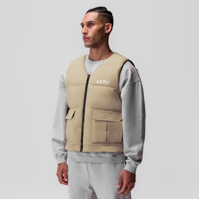 Ripstop Insulated Puffer Gilet in khaki worn over grey sweatshirt, front view