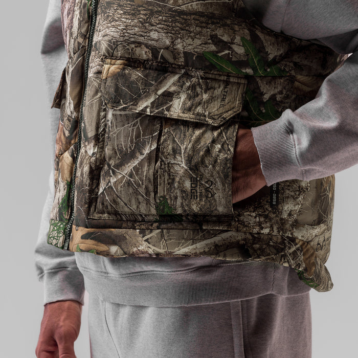 Ripstop Insulated Puffer Gilet in Realtree camo, worn by model, front view detail