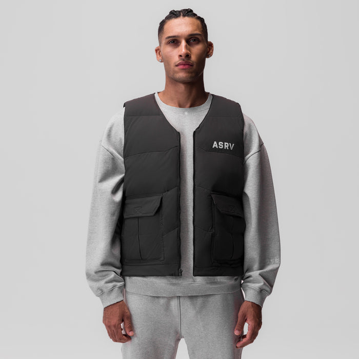 Ripstop Insulated Puffer Gilet in black worn over grey sweatshirt, front view