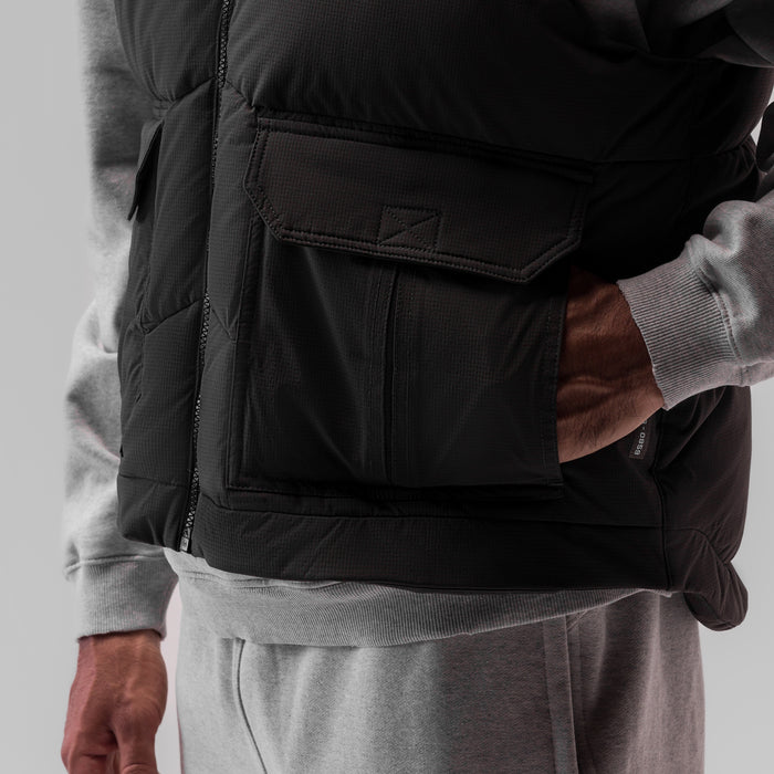 Ripstop Insulated Puffer Gilet in black worn over grey hoodie, side detail view