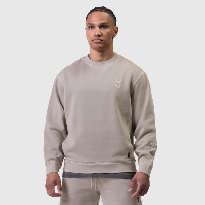 Tech Essential Distressed Crewneck in faded chai worn by model, front view
