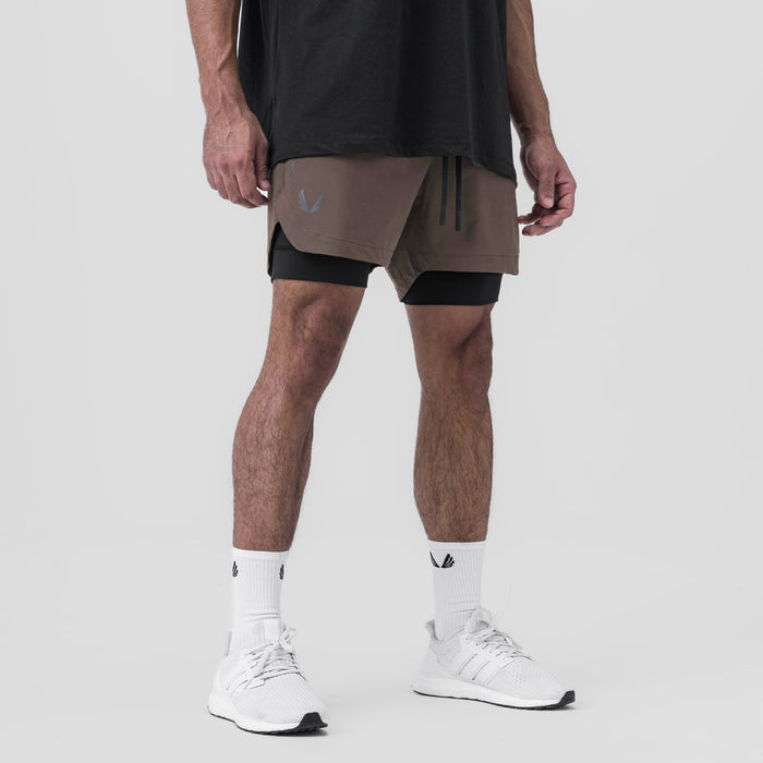 Tetra-Lite 5" Liner Short in Deep Taupe and Black, worn by model standing, front view