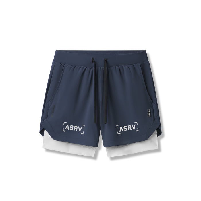 flatlay Tetra-Lite 5" Liner Short in navy and white, front view