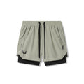 Flatlay of Tetra-Lite 5" Liner Shorts in Sage and Black, front view