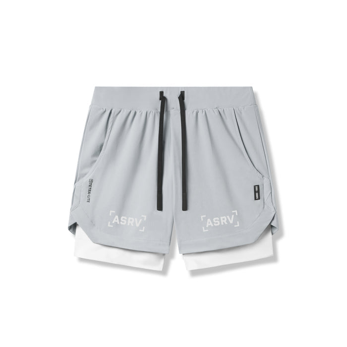 flatlay Tetra-Lite 5" Liner Shorts in slate grey and white, front view